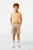 Lacoste παιδικό βαμβακερό σορτς μονόχρωμο με ανάγλυφο κροκοδειλάκι μπροστά (4 – 16 ετών) – FJ5242 Μπεζ